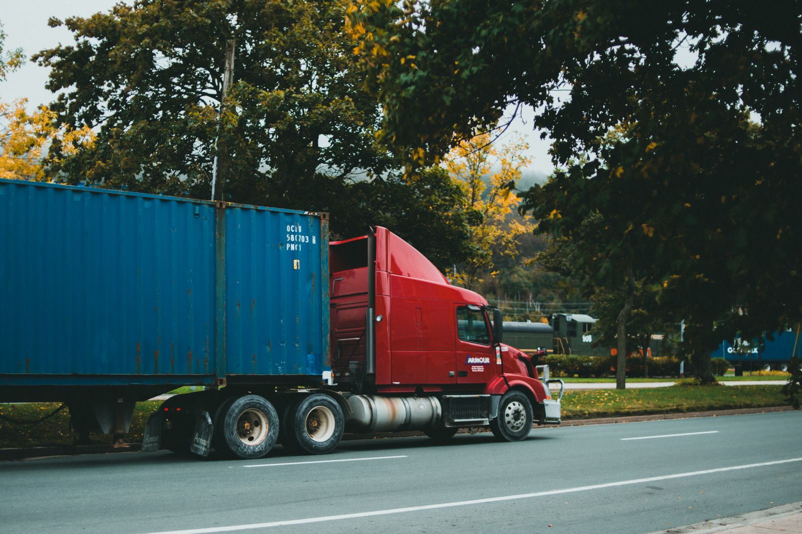 Container truck on a scenic road